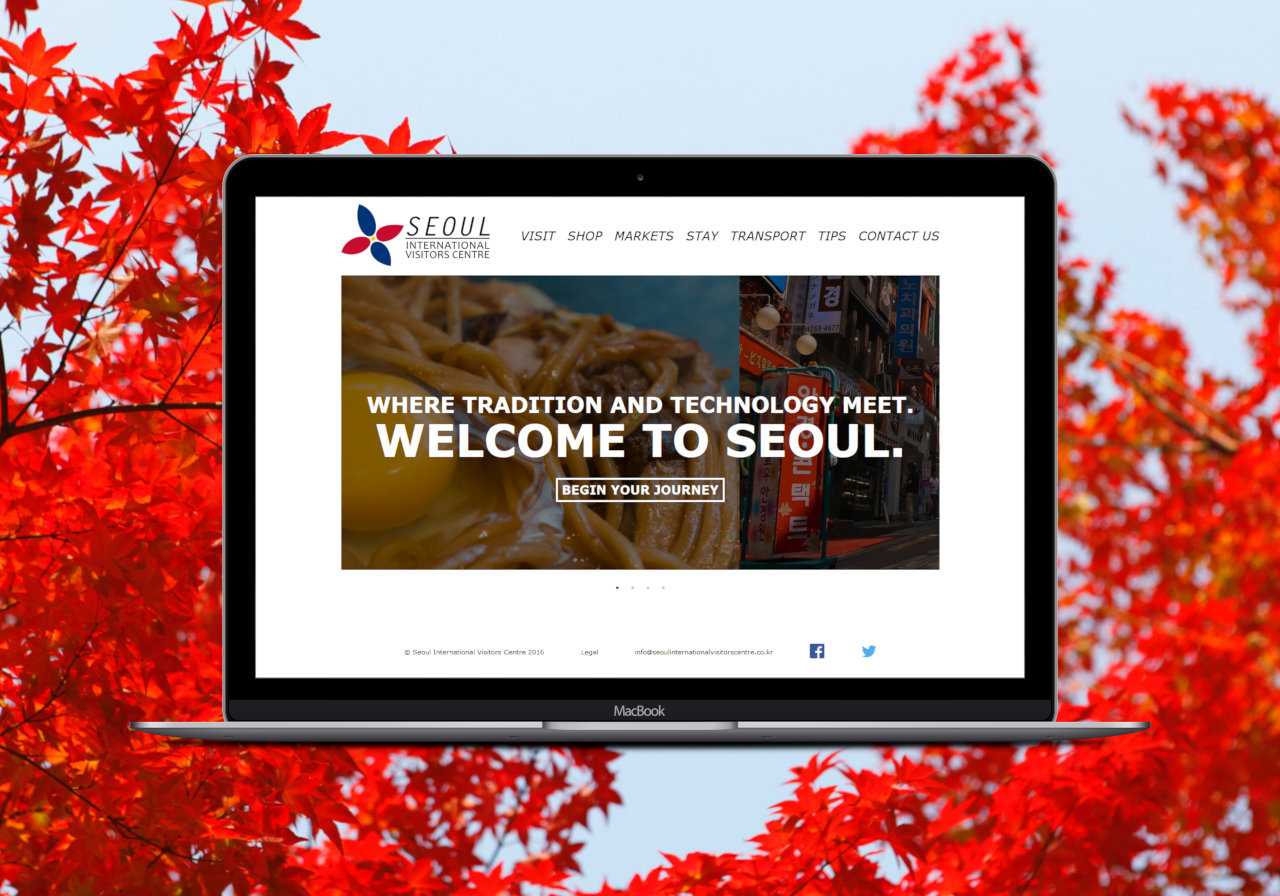 Seoul International Visitors Centre Homepage on a Macbook Pro. There is an image slideshow of various locations in Seoul.